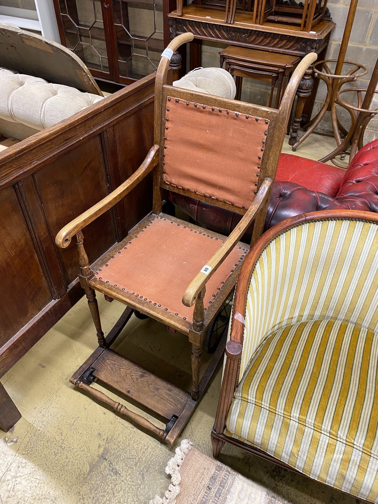 A late 19th century oak invalid’s chair, height 116cm